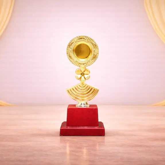 Golden trophy on polished pedestal